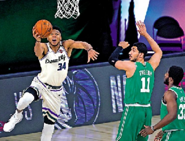 公鹿勇擒塞尔特人  公鹿主力阿迪图昆保上篮得分 中网体坛,oubili.com